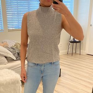 Gray sleeveless turtleneck top